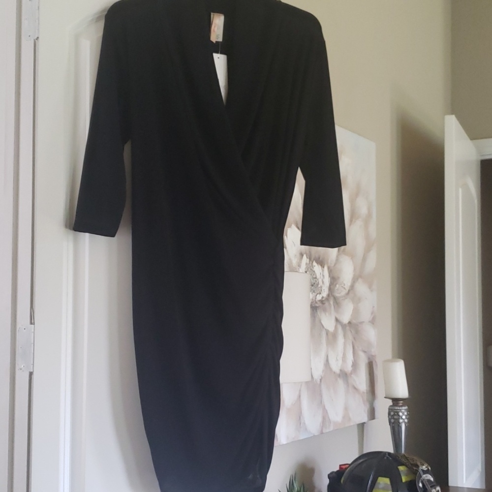 Knit black dress .